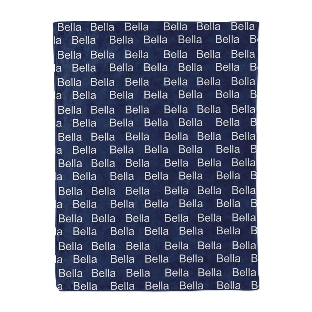 Navy blue blanket with Bella text pattern featuring printing in a personalized design.