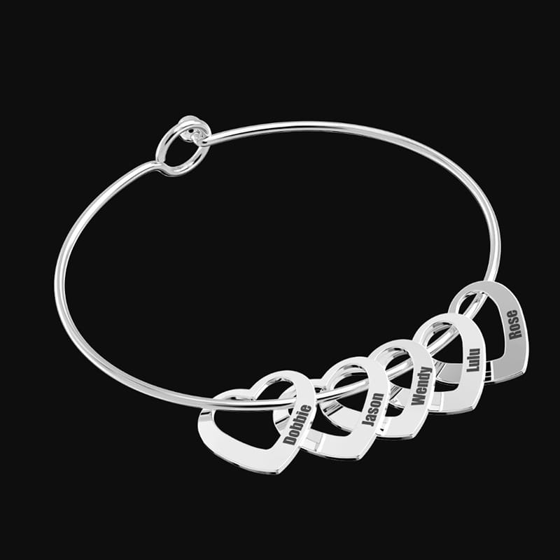 Silver heart charm bracelet from Love Bracelet Peach Heart Name Lettering Jewelry.