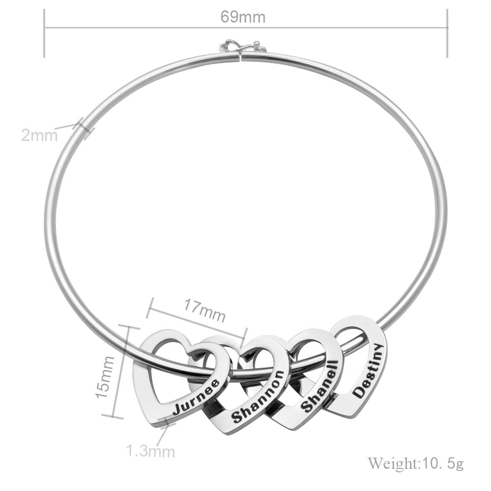 Silver bangle with peach heart name charms for a cute bracelets jewelry look.