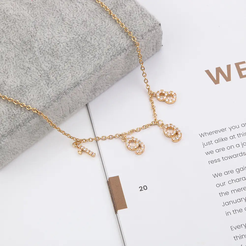 Gold Zircon Letter Necklace with Diamond-Studded Angel Design for a DIY personalized necklace