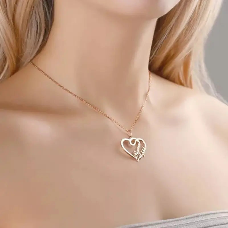 Gold heart pendant necklace in Custom Name Double Heart Necklace for stylish jewelry lovers.