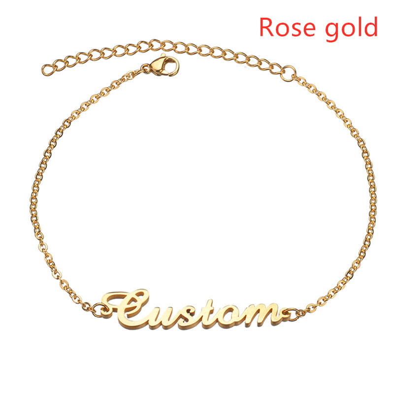 Personalisiertes Namensarmband aus Titanstahl in Roséfarbe im individuellen Stil