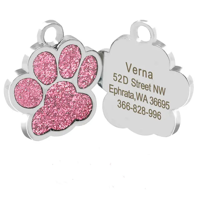 Pink glitter paw print personalized dog tags for cats and puppies, engraved for uniqueness.