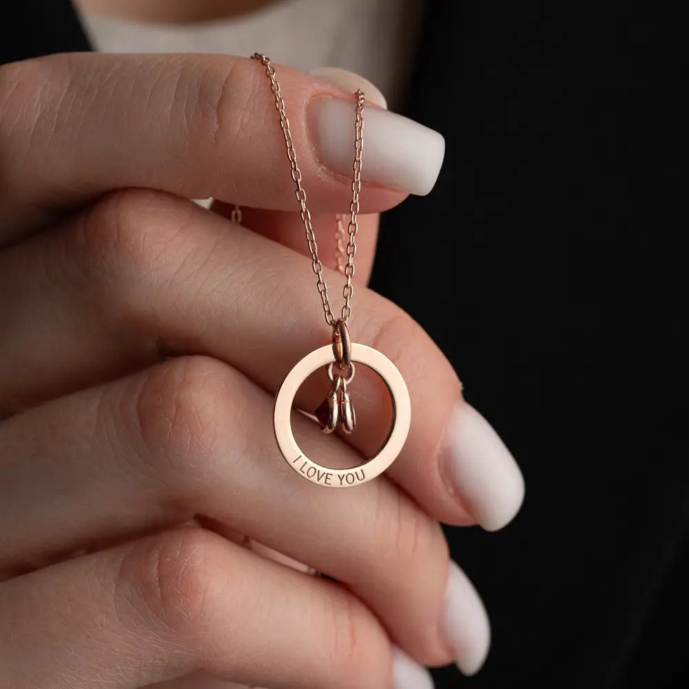 Personalized Engraved Birthstone Circle Necklace in Rose Gold with circular pendant.