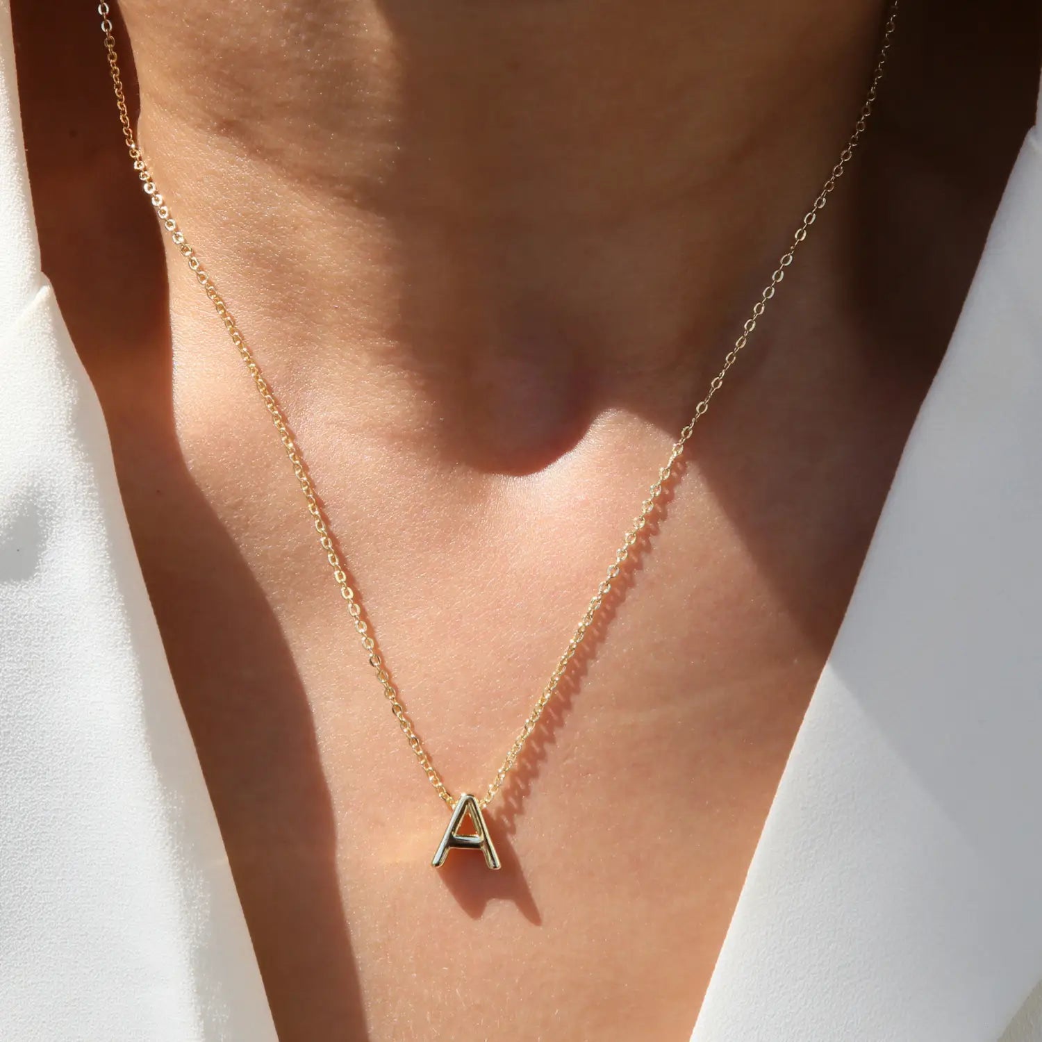 Gold letter A necklace in 18k gold glossy for an elegant DIY English style.