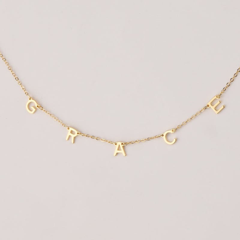 Gold GRACE letter necklace in custom cute multi letter design for fashionable women jewelry.