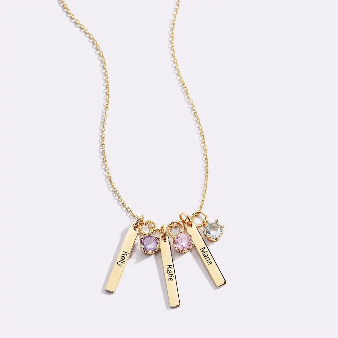 Gold necklace with personalized name pendants and gemstones in stainless steel jewelry.