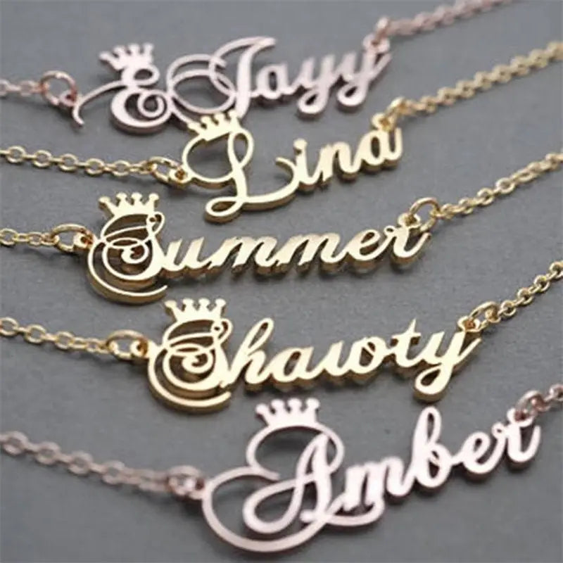 Personalized Gold Nameplate Necklaces with Crown detail, perfect for stylish gifts.