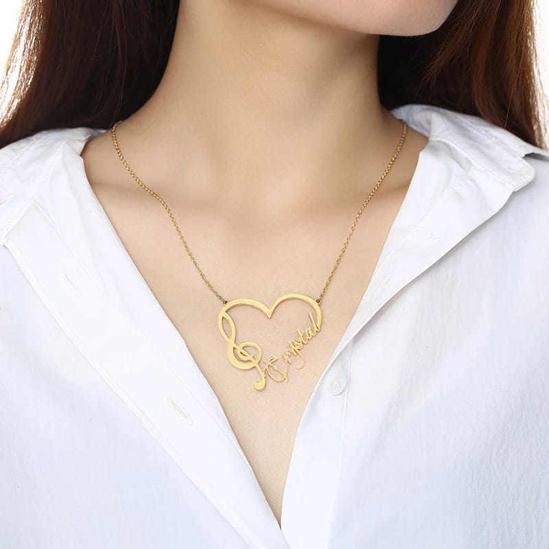 Gold heart-shaped personalized necklace in stainless steel jewelry for a unique gift.